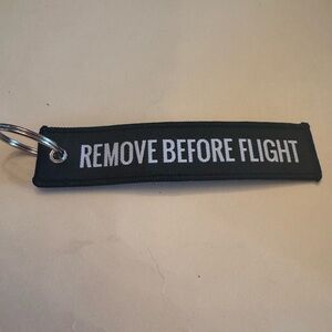 Black Keychain with White Text